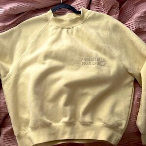 yellow essentials sweatshirt